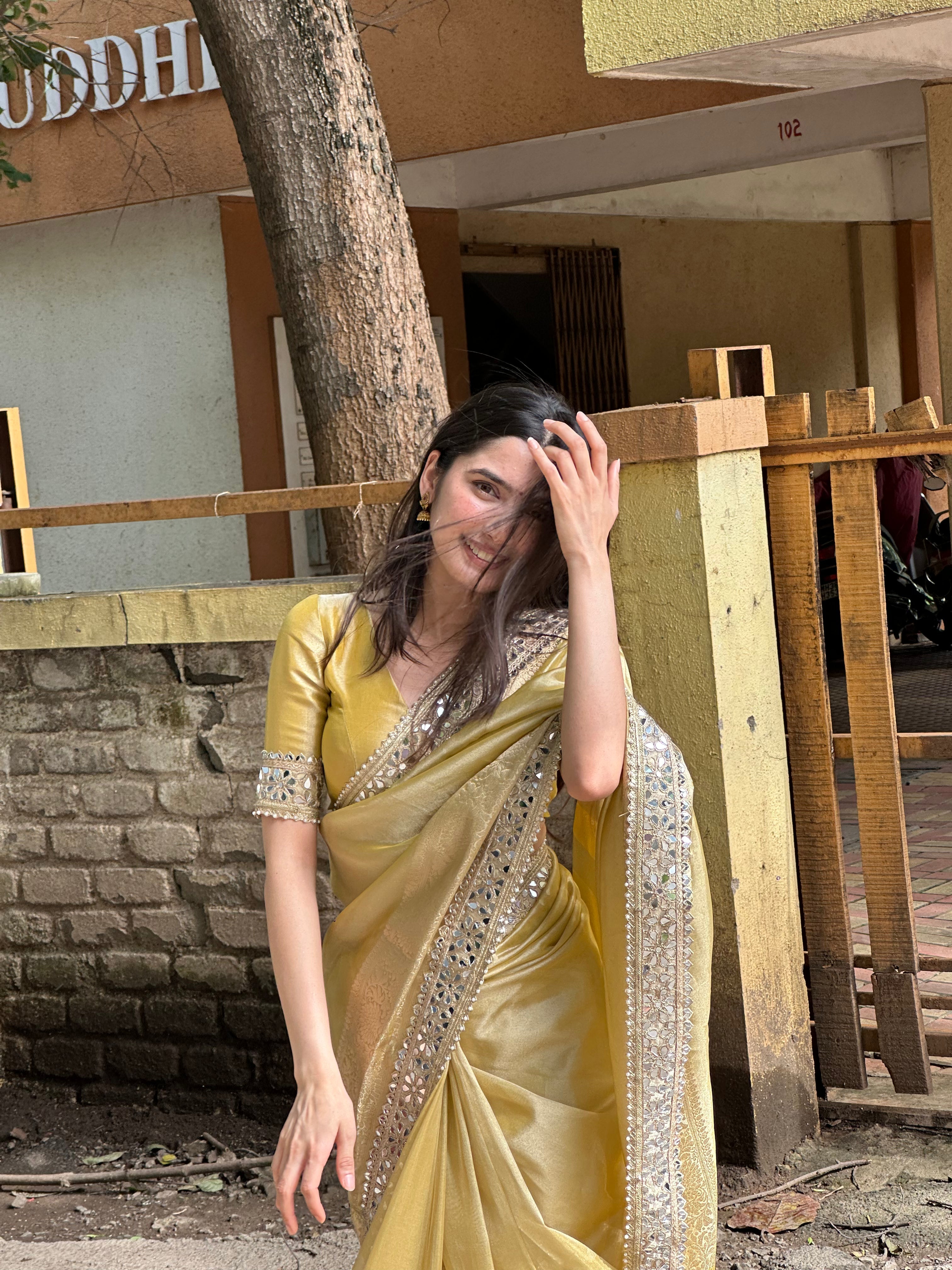 Yellow Gold Banarasi Rajkumari Mirror Work Tissue Silk Saree